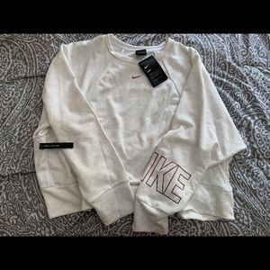 Nike Dry-Fit crop sweatshirt.